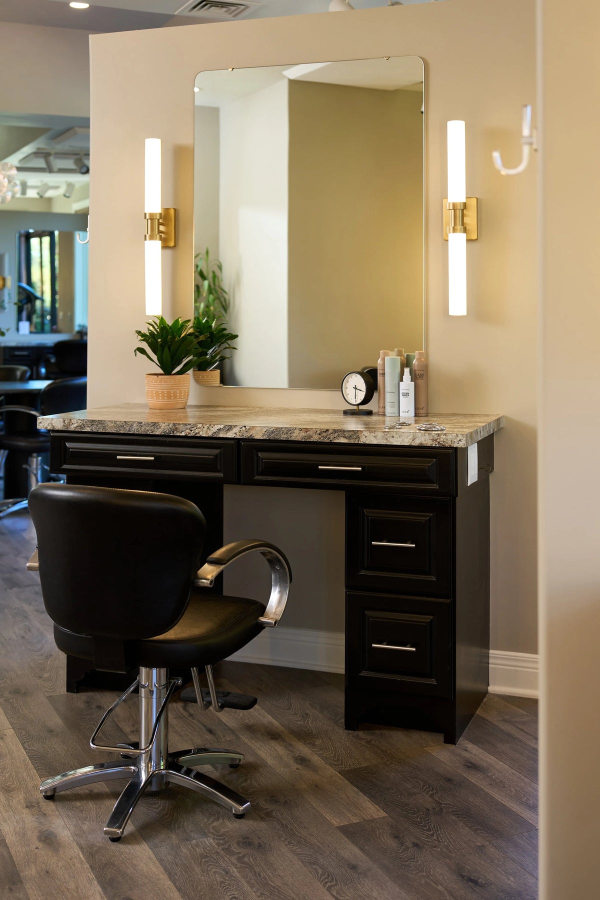 Black salon chair and vanity